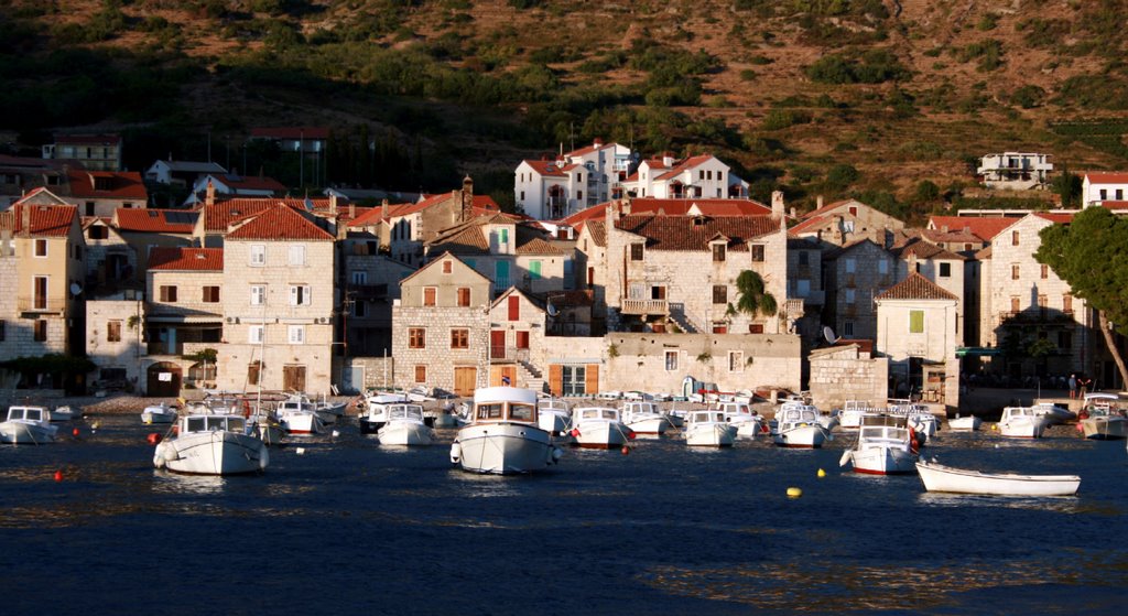 Evening sun in Komiza harbour on Vis by Toni Falkner