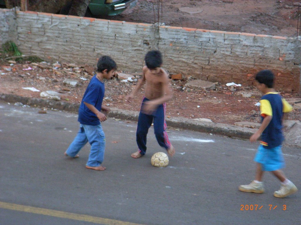 Children play football by tilamook