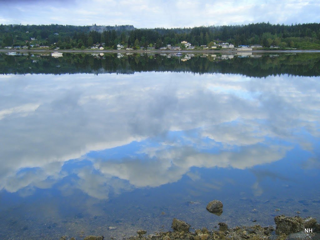 Poulsbo clouds reflected on Liberty Bay by Nick Hoke