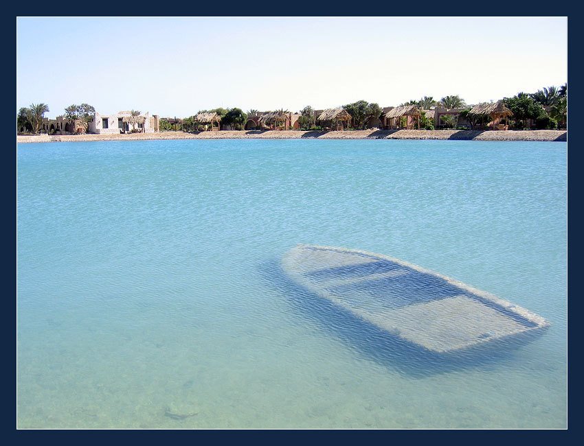 Sunken Boat in Jasmine Village Hotel by Ariil Davidoff