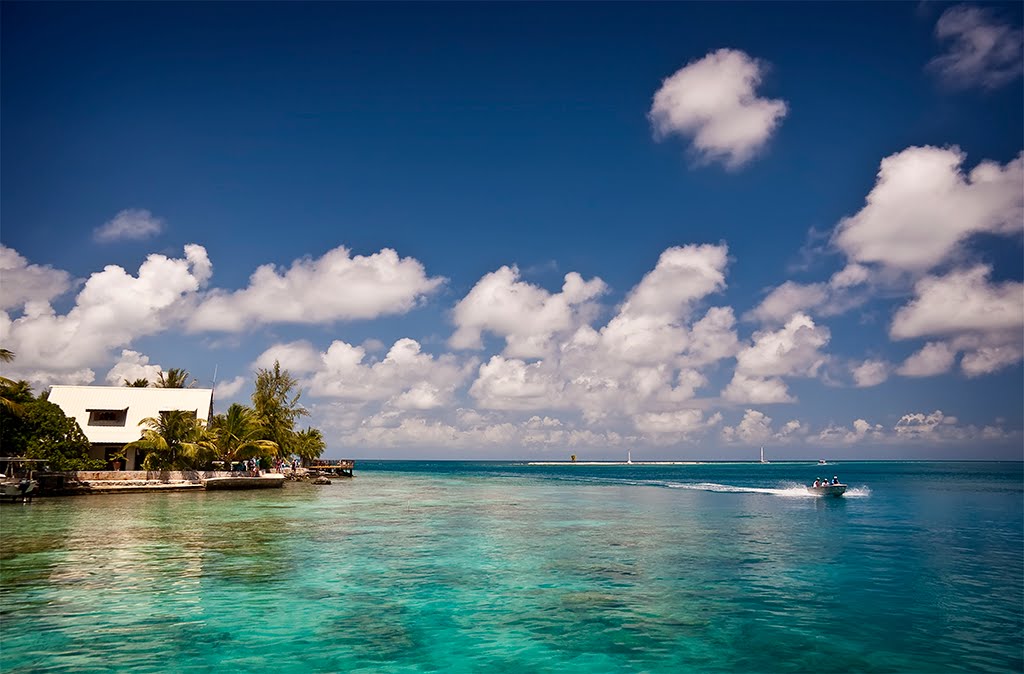 Boat near Rangiroa by Phil Comeau