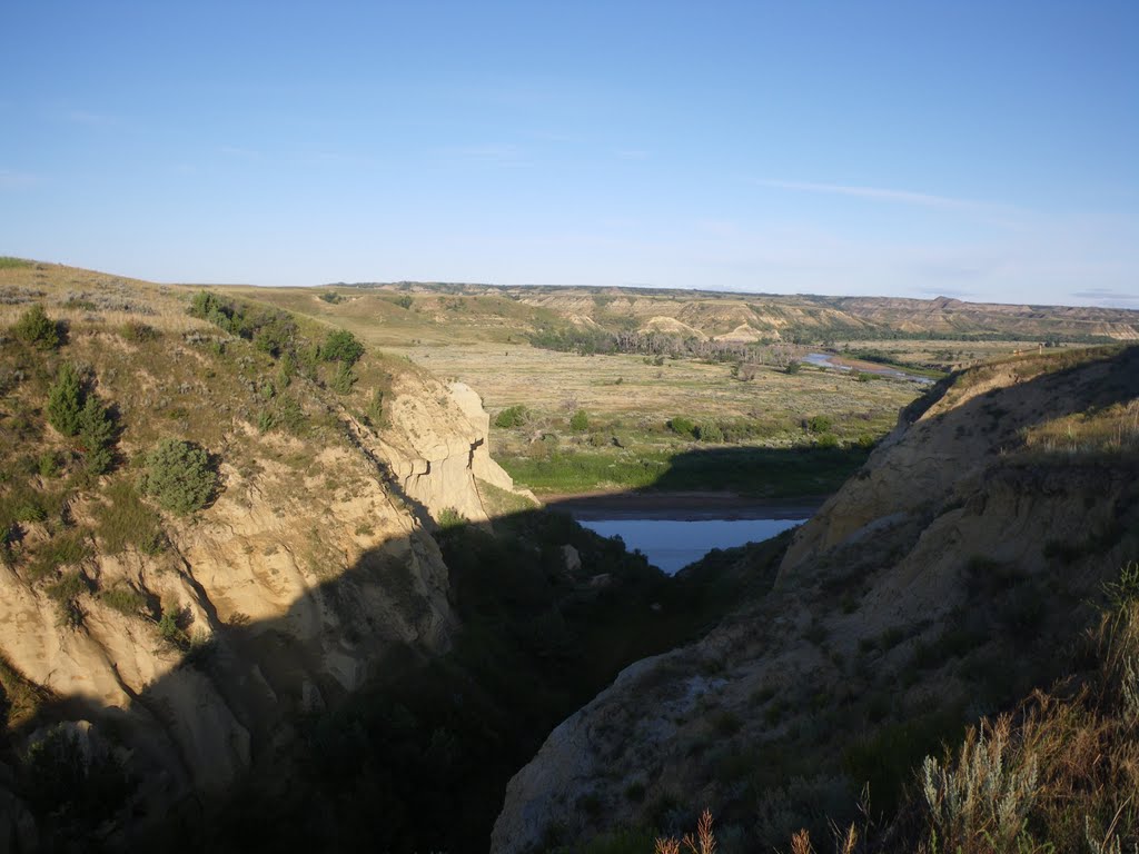 Sun's warmth thaws the badlands. August 2009. by Lukas Eddy