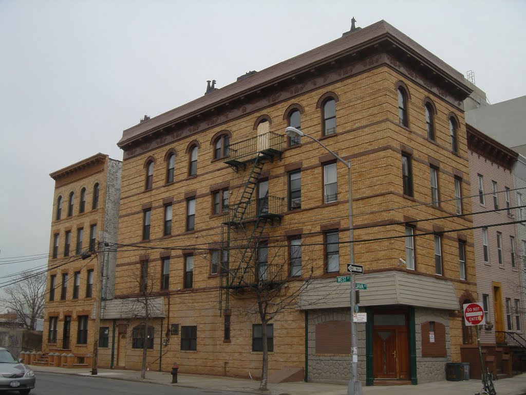 Old apartment building on corner of West and Java Street facing northeast by Robert Reichenbach