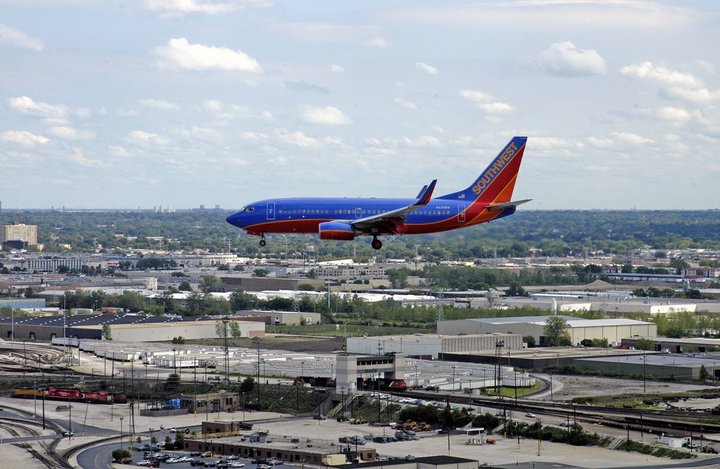 On final approach, into Midway by www.okrentassociates.com