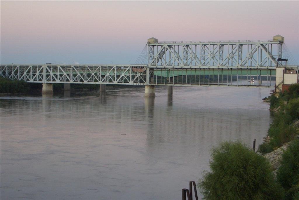 ABS bridge and Heart of America bridge, can see dredge barge on Missouri River, looking east from elevated pedestrian platform, Kansas City, MO by marnox1