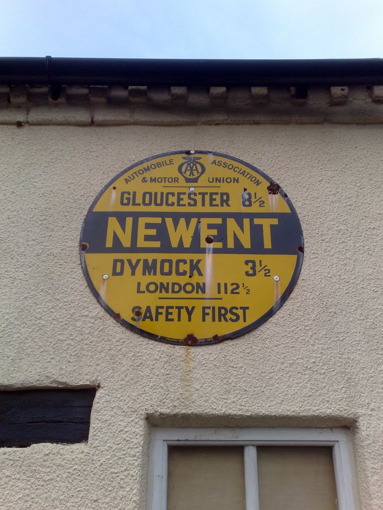 Distance sign, on building in Bury Bar Lane, Newent by bcfczuluarmy