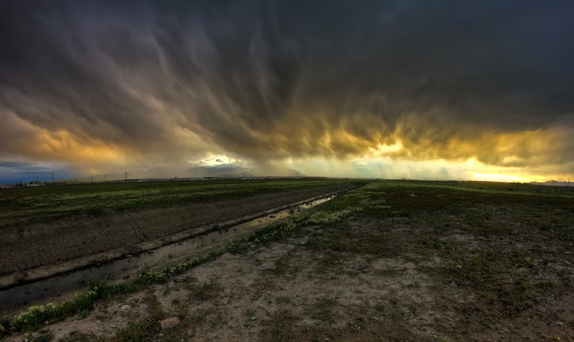 Sunset storm and viaduct by spencer baugh