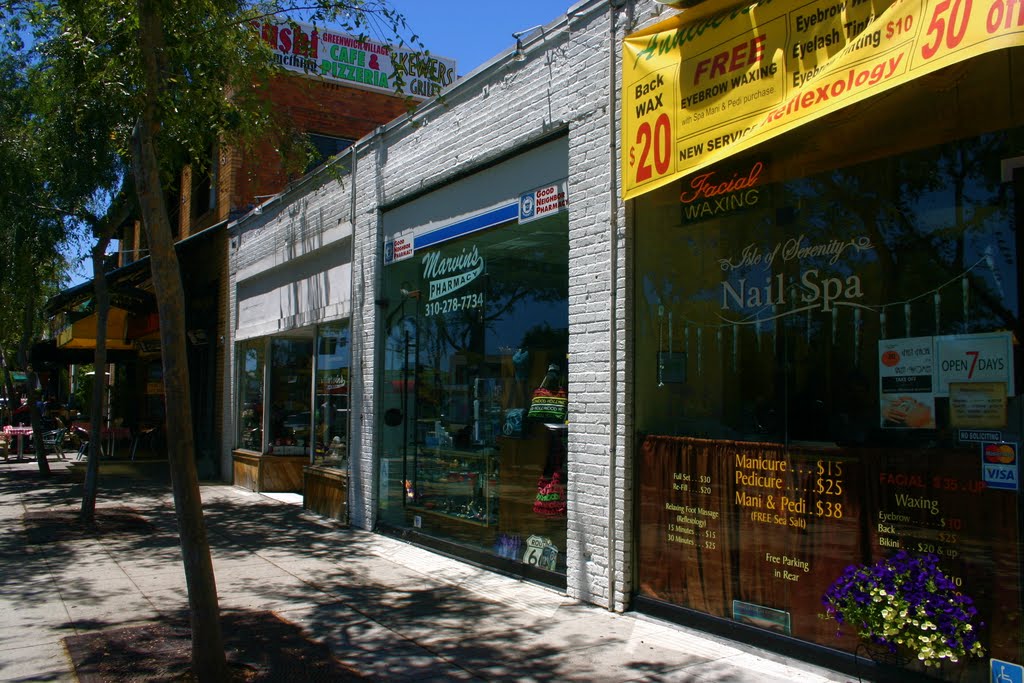 Little shops align Santa Monica Blvd. in West Hollywood, CA by MICHAEL  JIROCH  &  www.michaeljiroch.com