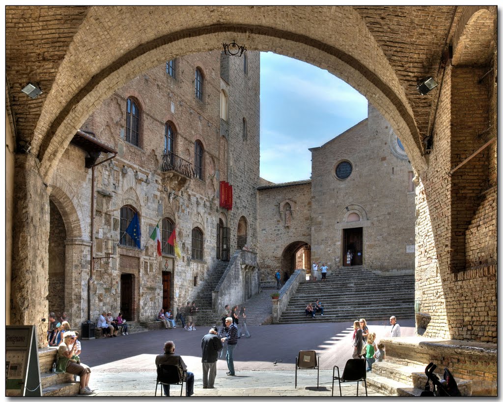 The arches and squares of San Gimignano by Herb Riddle