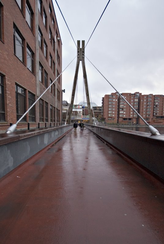 Pedestrian bridge from Laukontori to Koskikeskus shopping centre. by Janne Ranta