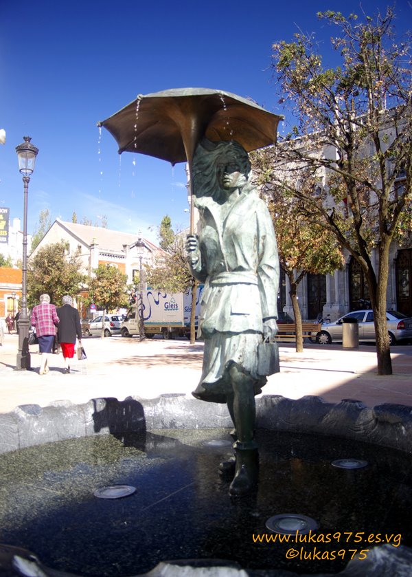 Joven con paraguas, Burgos by Jose Luis Albor