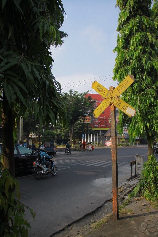 BEWARE TRAIN CROSSING ROAD by bocah.info