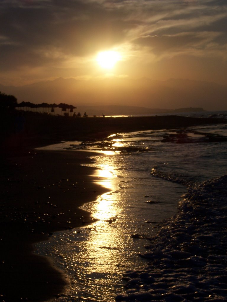 Sunset on the beach by Yvette