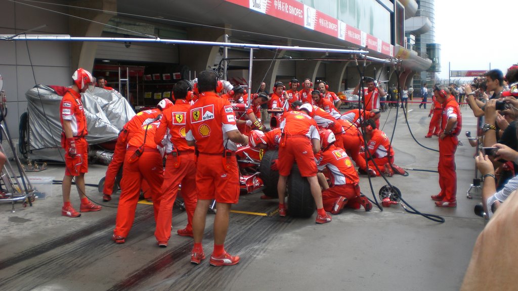 Ferrari team practicing pit-stop by Ed Ayvazyan