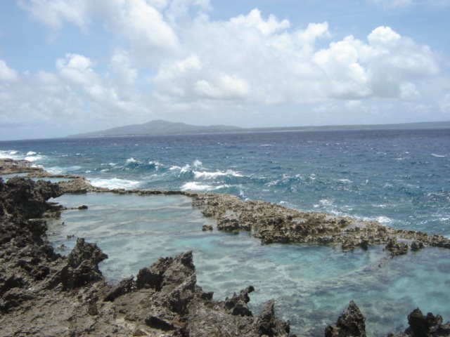 Saipan in the horizon (view from Blow Hole area) by Veronica Caballero