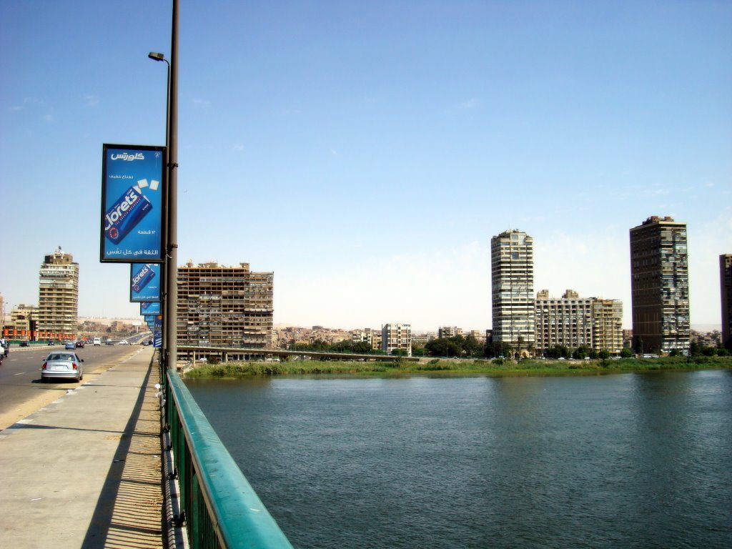 Al Mounib bridge & Corniche Al-Nil at Dar Al-Salam, at noon, Cairo by Alaeddin Faruki