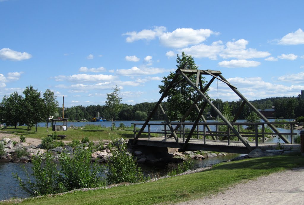 Wooden bridge by Petri Saarinen