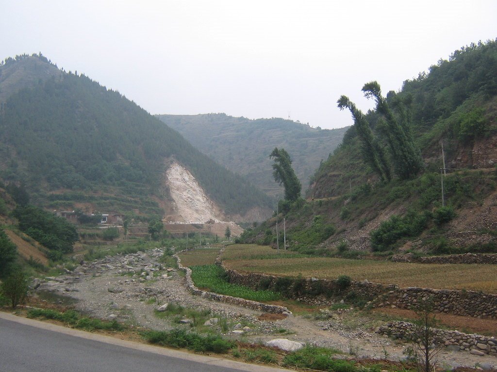 Near DkC_215 - valley north of Danfeng, marble quarry in the background by Seuche