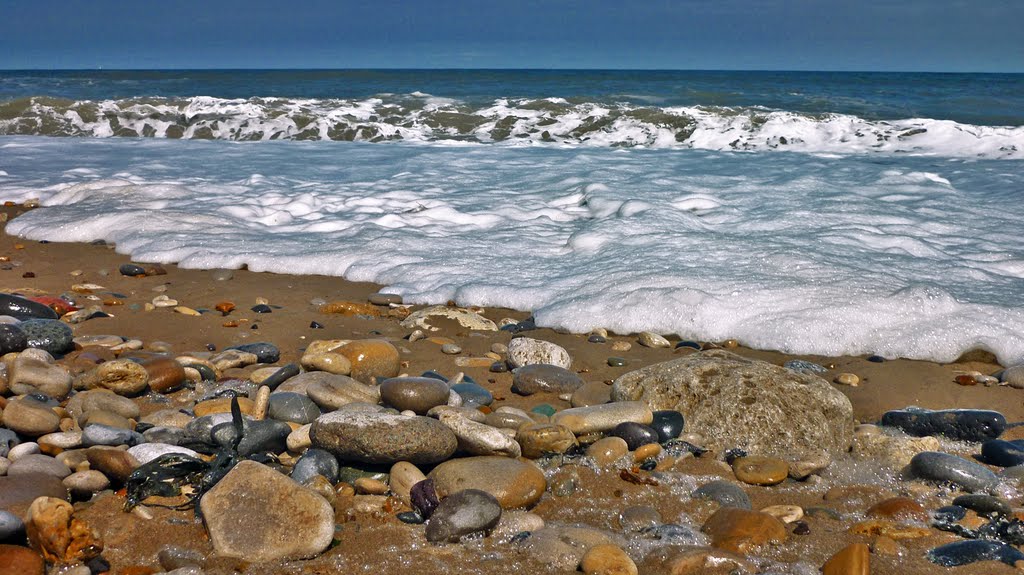 Pebbled beach by Dee Wainwright