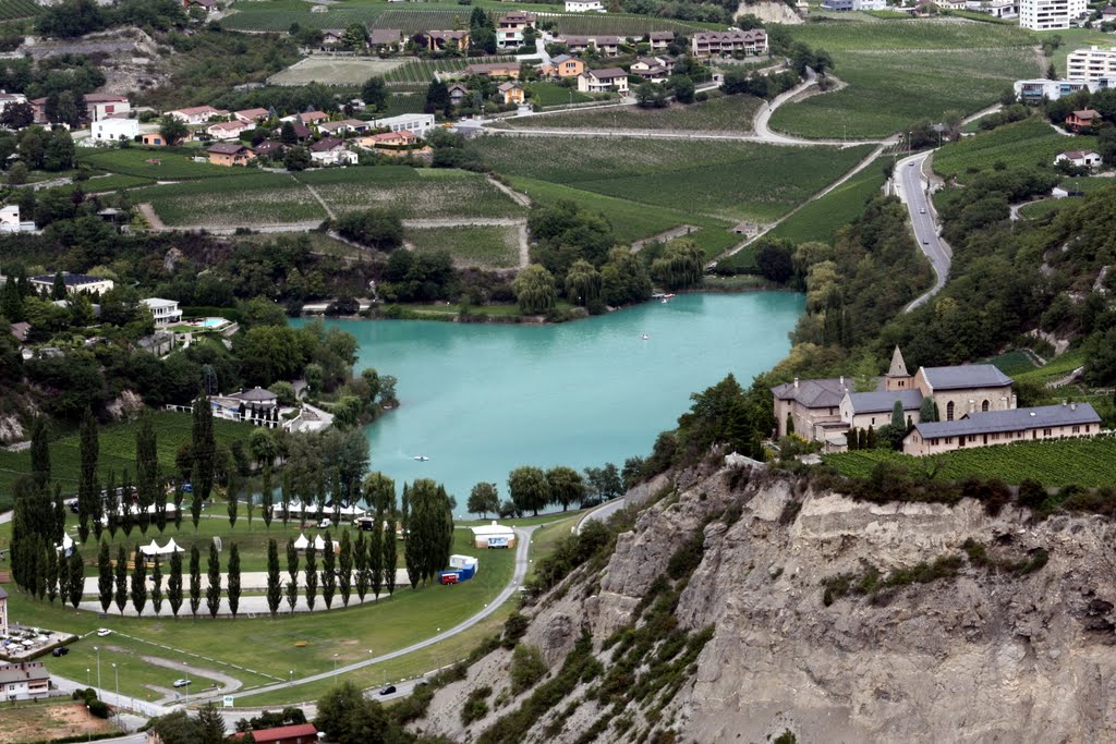 Sierre - le monastère de Géronde et le lac bleu turquoise by Charly-G. Arbellay