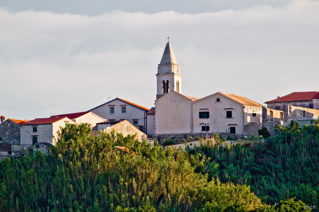 Susak upper village from port by brch