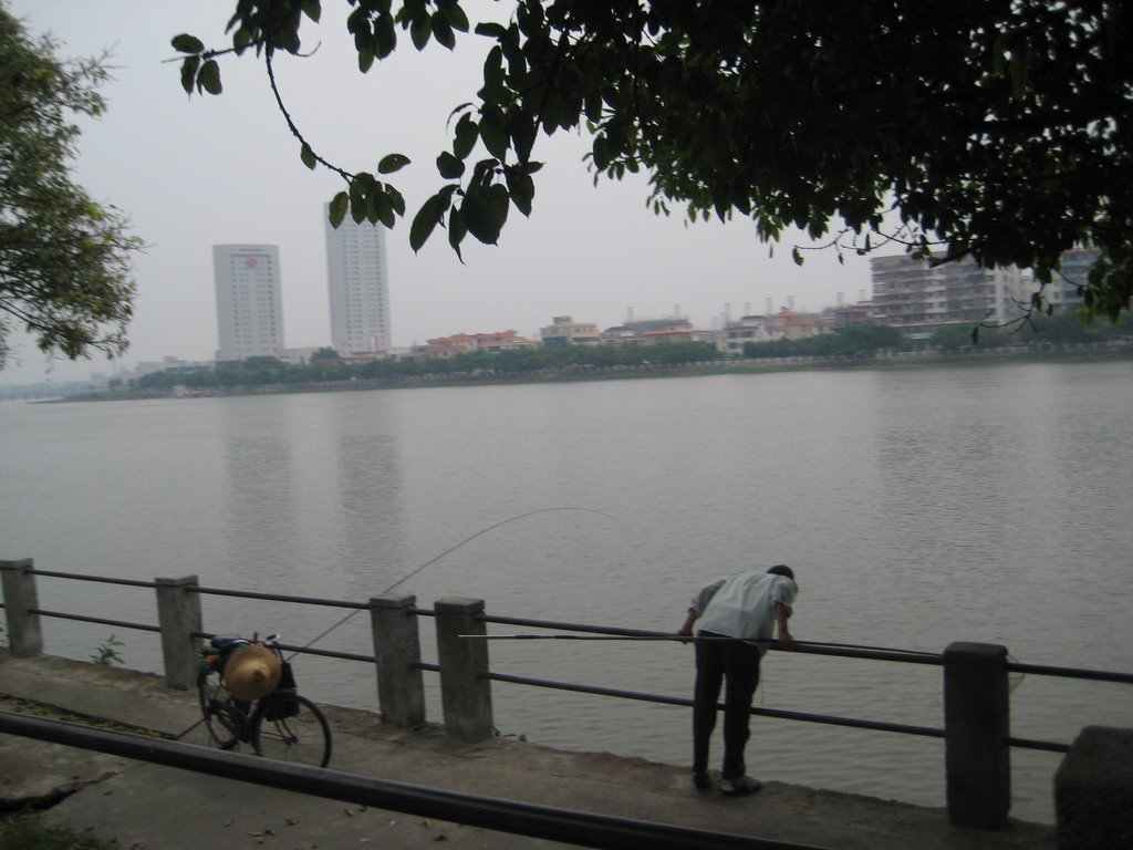 Fishing man in yuang jiang road by Lily Ng