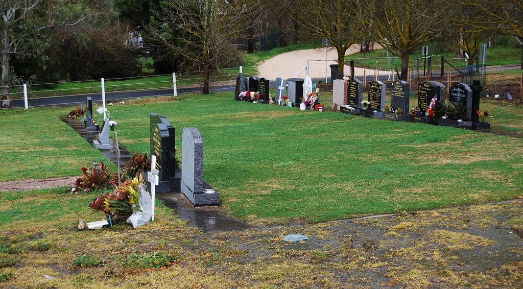 Recent lawn grave plots by Phaedrus Fleurieu