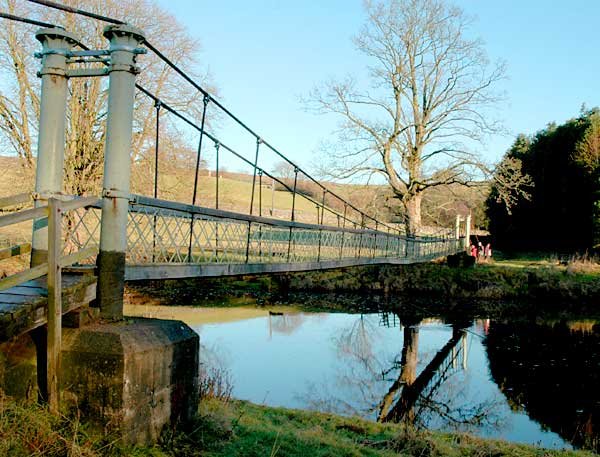 Hebden Suspension Bridge over the River Wharfe by David Alcock