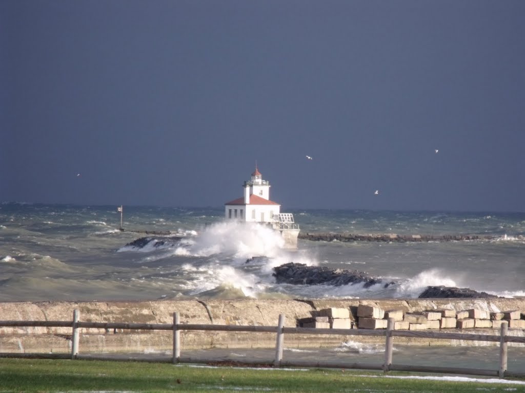 Wind storm by the Oswego Harbor Lighthouse by richlafond