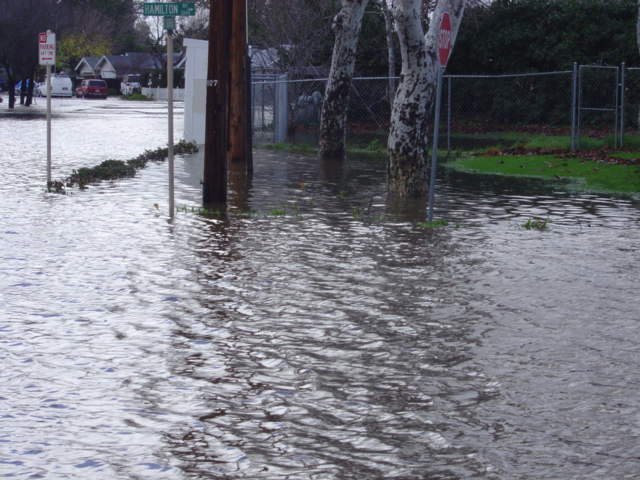 2005 Flood: Standing on Hamilton Road looking towards Olivera Road flooded by baker7598