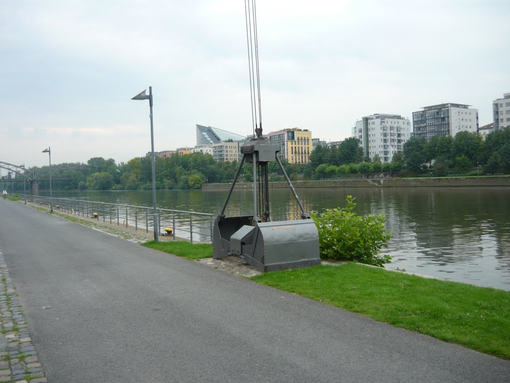 Cape monument of an old crane on the River Main, Frankfurt, Germany. by yacovro