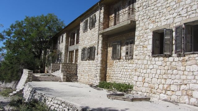 Prison cell block with guard sleeping quarters above on Goli otok by klauskk