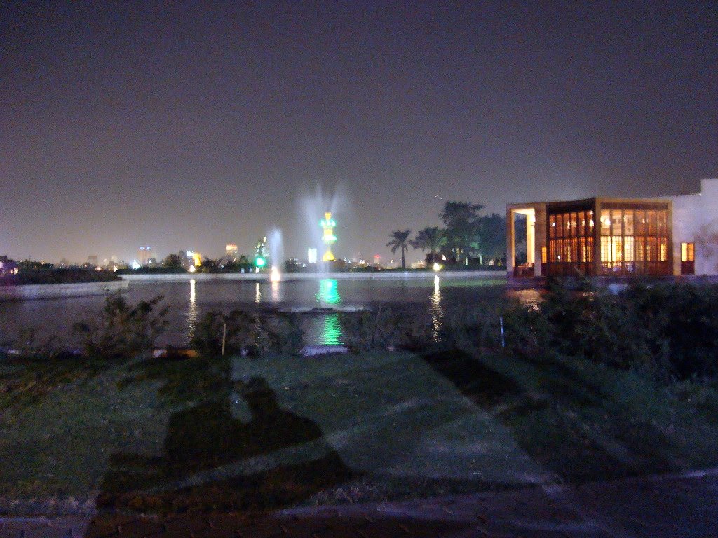 Al-Azhar Park at night, Lakeside cafe & my shadow, Cairo by Alaeddin Faruki