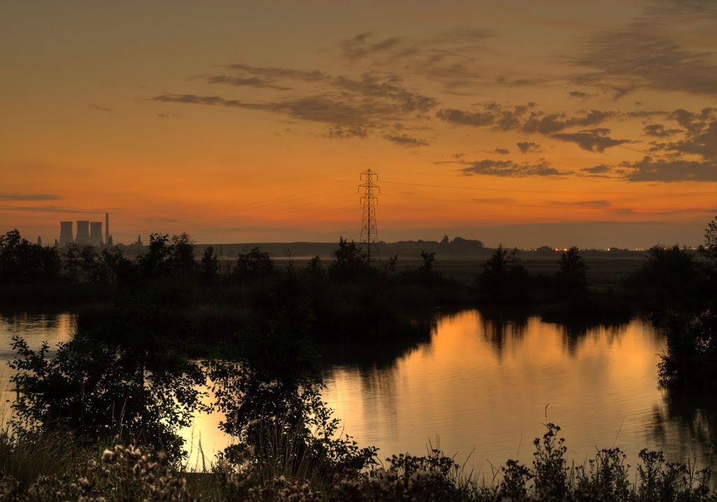 Sunrise over Sandwich Lakes, Kent by Herb Riddle