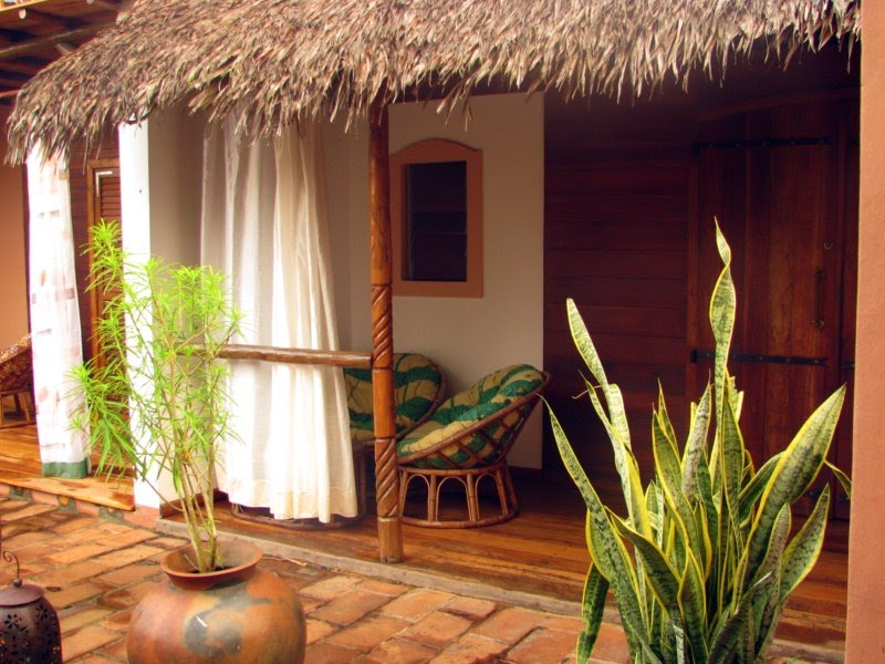 Each room has a cosy terrace. Madagascar. Ambatoloaka, Nosy Be. by Linda De Volder