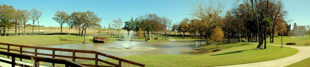 Scenic creek with fishing pond by bkenney