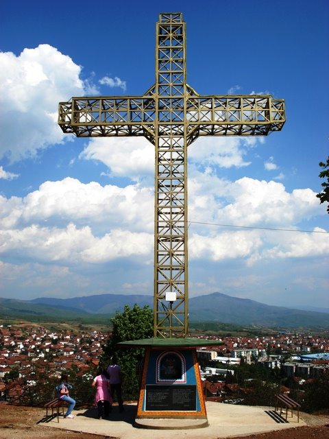 Cross on a town hill by dragik001