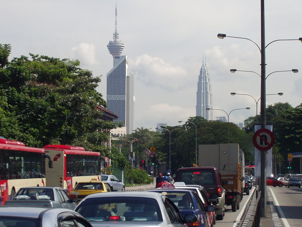 KL & Twin Towers crossing Jalan Tun Sambanthan by Nicchio