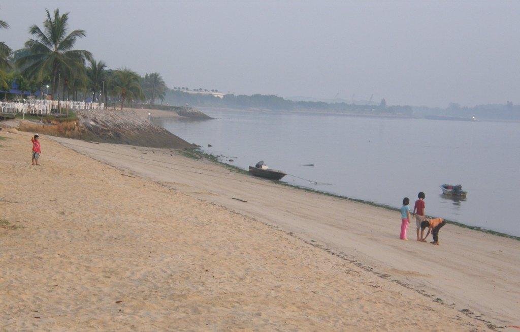 Morning Walk at Pasir Ris Beach by Luis Cahigas Jr