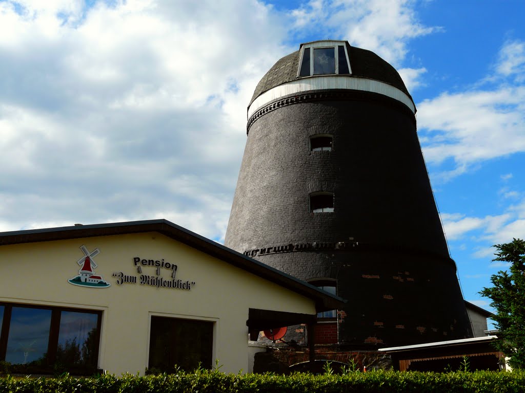 Germany_Mecklenburg_Woldegk_Mühlencafé Mühle Ramme_tower windmill with a revolving cap without wings_P1250124.JPG by George Charleston