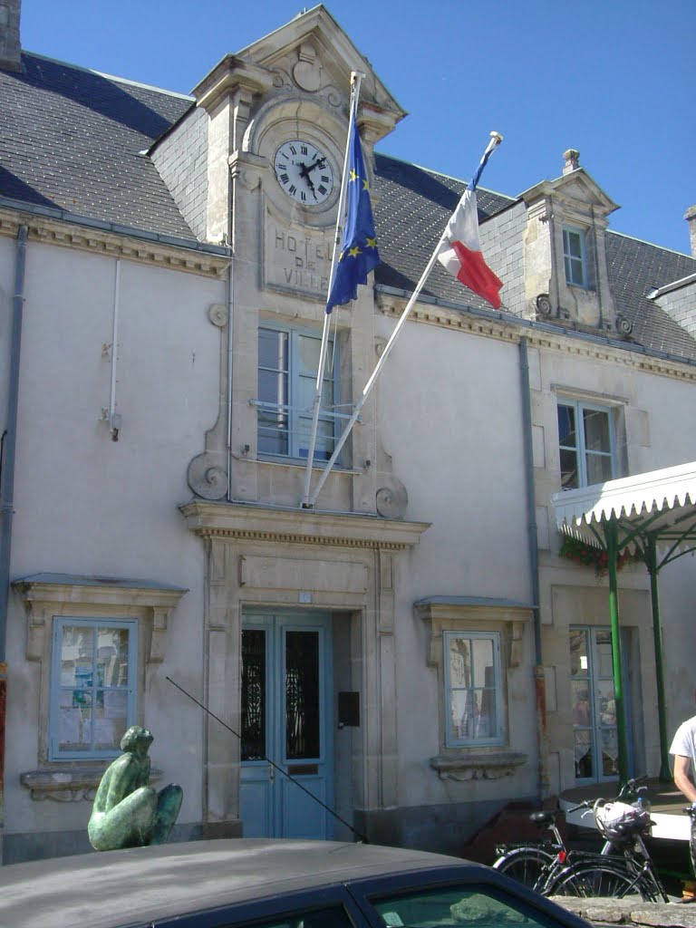 City hall of Nourmoutier-en-Ile, France with flags by John Rotterdam