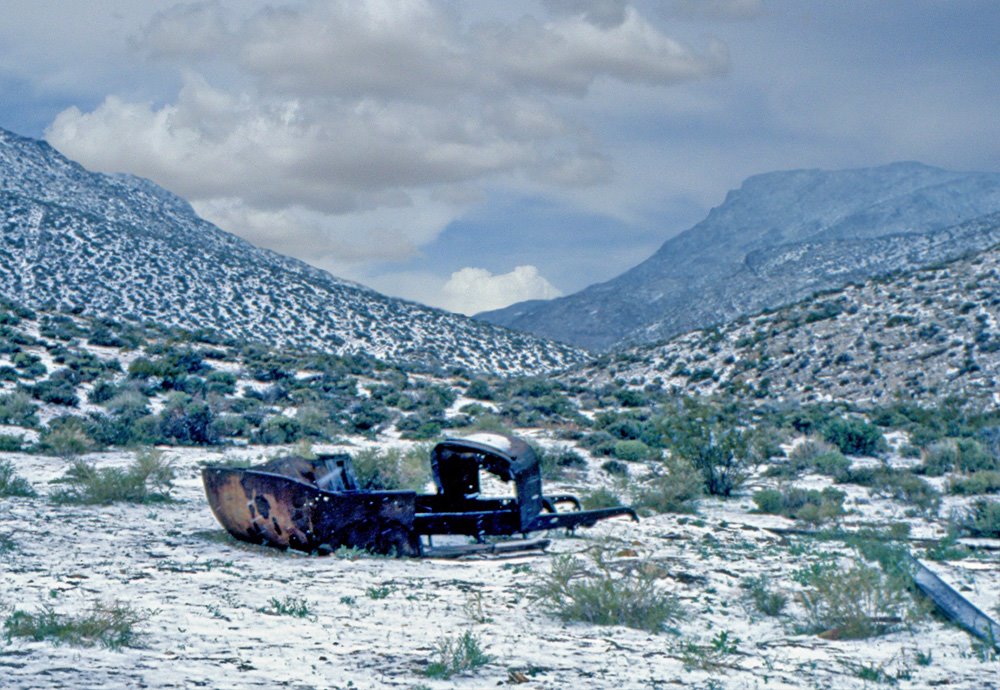 Tub in the snow Chloride City. It's gone now, such a pity. Search the cliff as best you can, mine down there reached by a tram. Been declared a wilderness, can't go now, can only guess. by Bill Cook