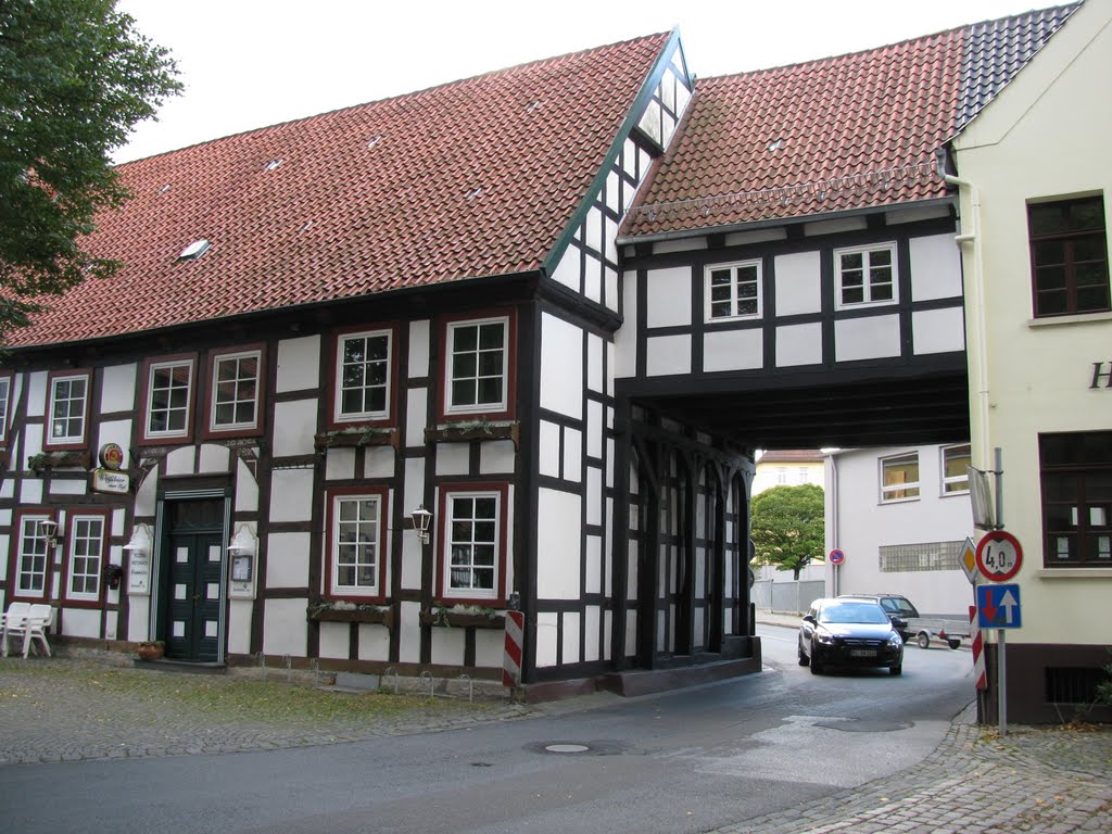 Buer, road passing under houses by Seimen Burum