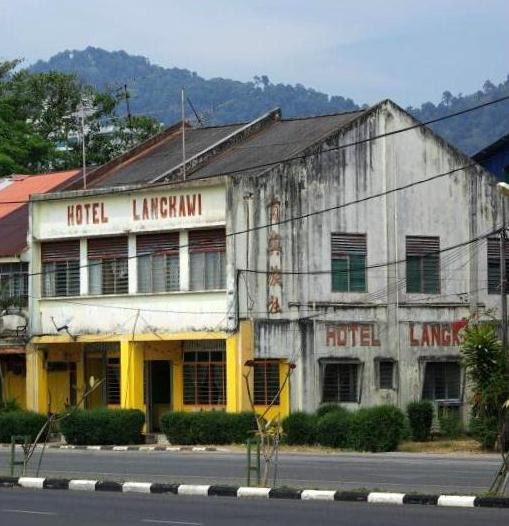 The Langkawi Hotel, one of the oldest hotels in the island, viewed from the shop across the road by Suzanna Chan