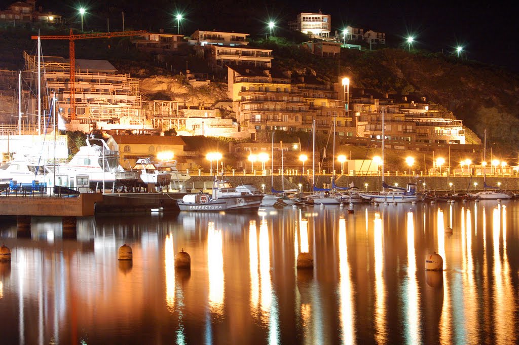 Reflection in port night by Gustavo Marquez