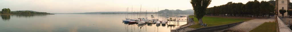 Panoramic view on the bay of Angera and the harbor by phliphip