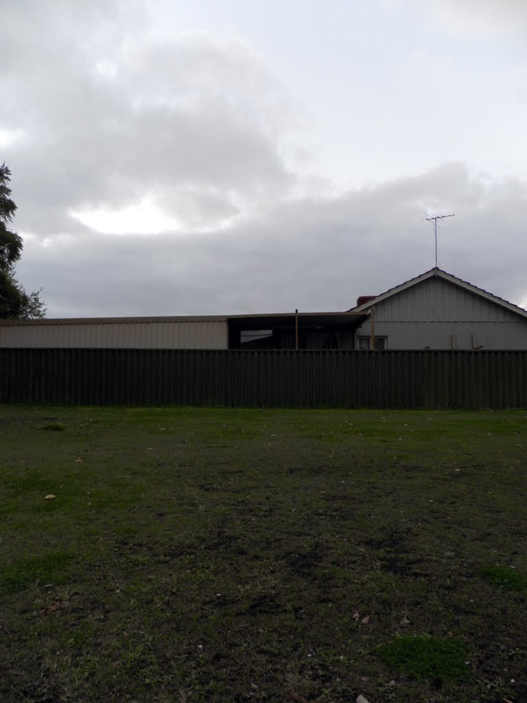 An older house, with antenna by Dylan Hewson