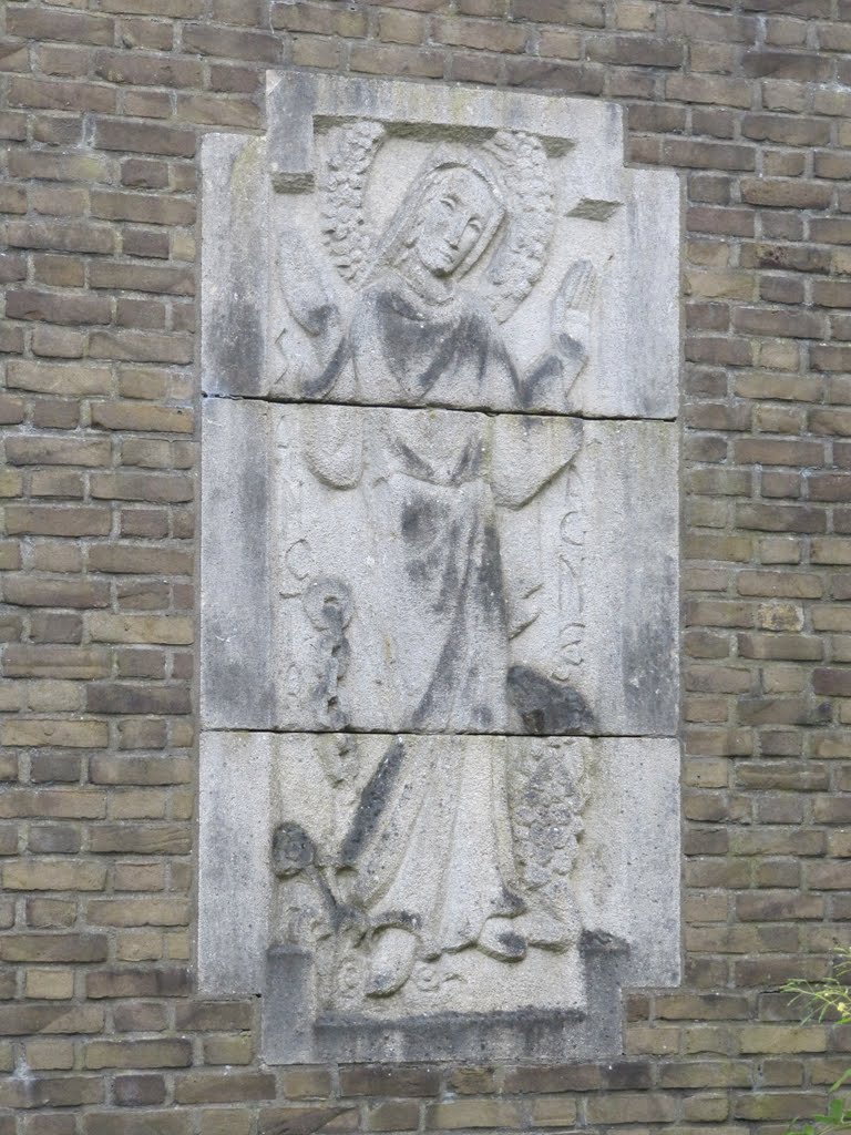 Relief of Saint Agnes at the wall of the former monastery Onze Lieve Vrouwe Ter Eem (Our Lady of Ter Eem) by Willem Nabuurs