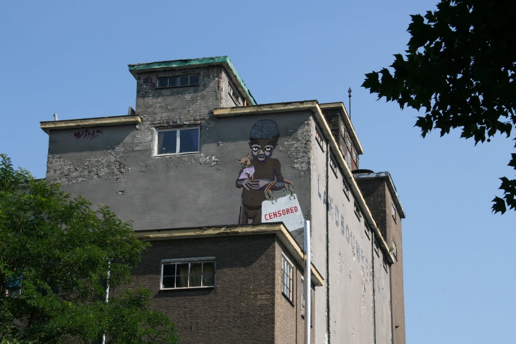 Child with censored bag on the wall, Maastricht. by Carl030nl