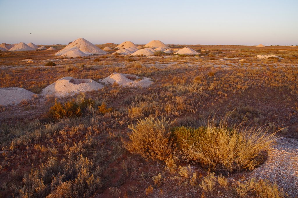 Sunrise over mullock heaps: Coober Pedy by James Vickers